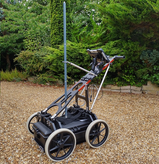 A Norse Radar wheeled GPR survey cart fitted with antenna mast, controller and display